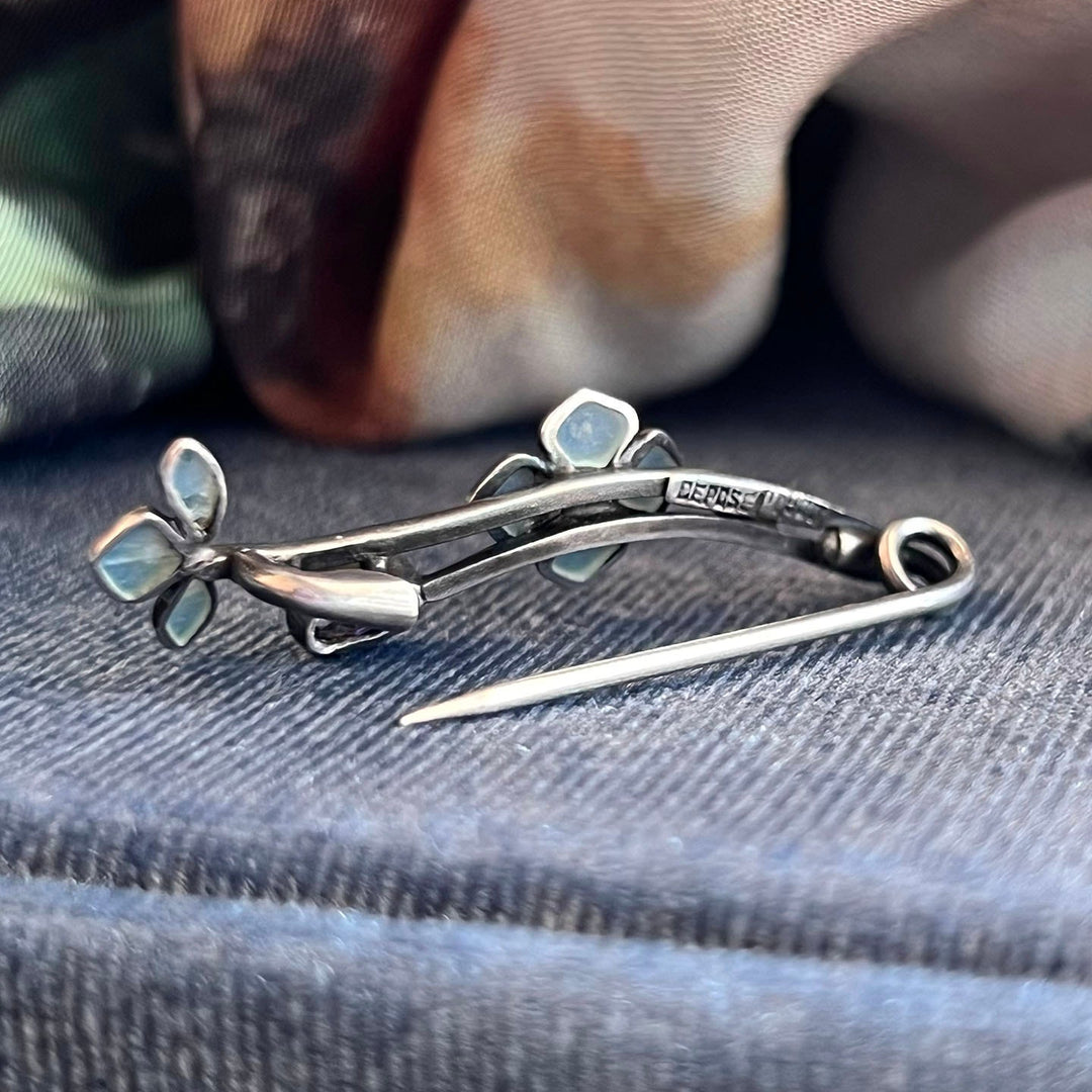 Detailed view of translucent enamel jewelry