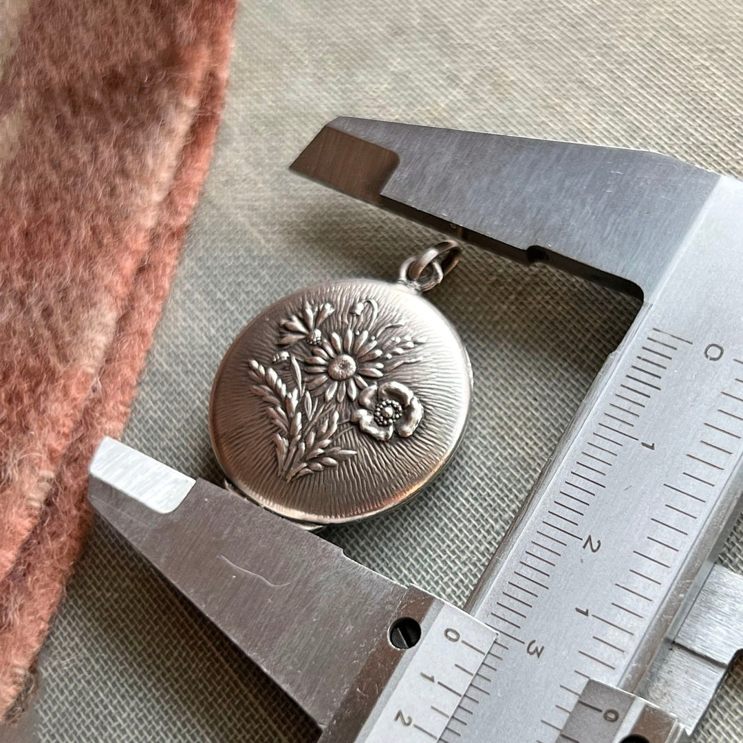 Antique floral locket repoussé silver classic French design