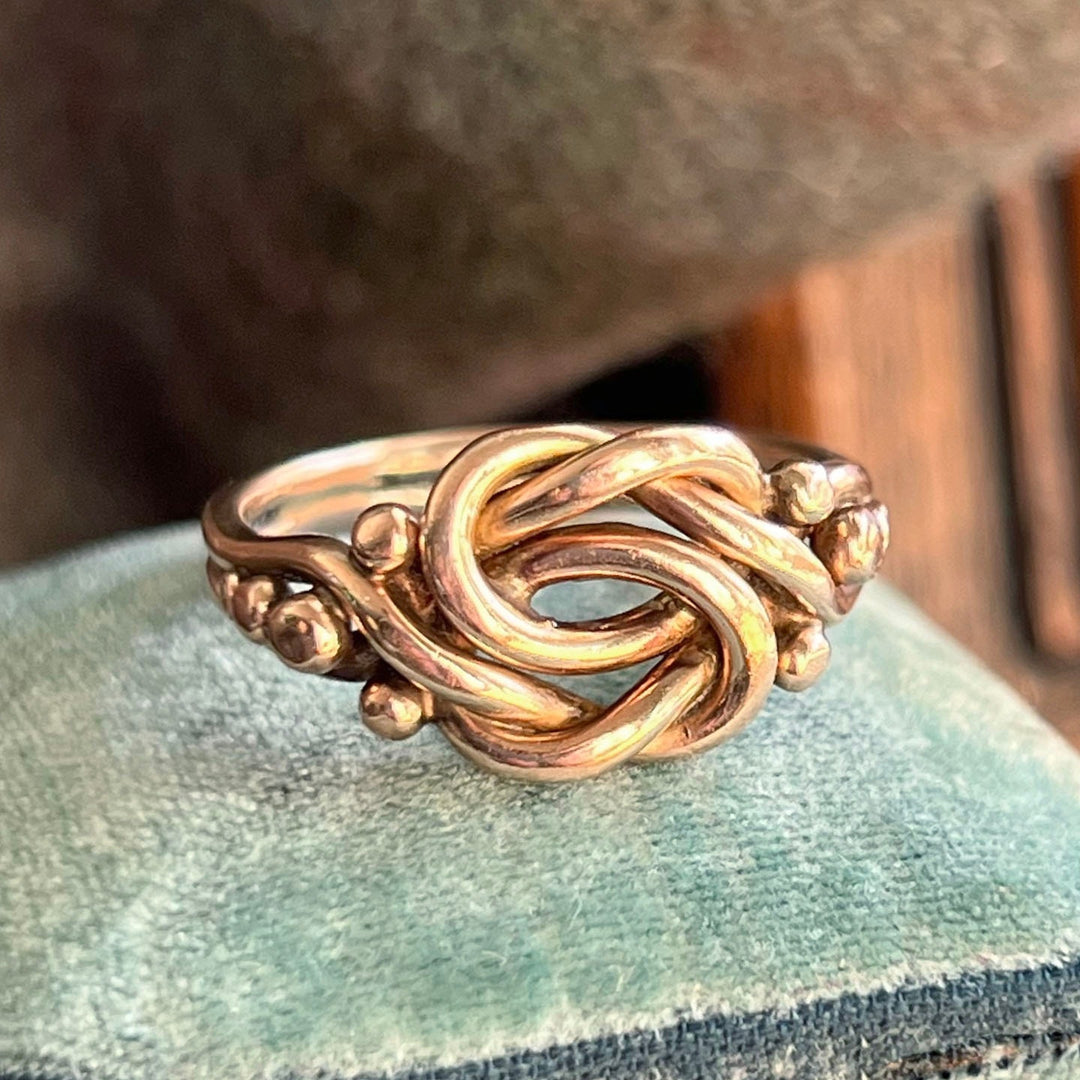 Victorian love knot ring worn on hand antique style
