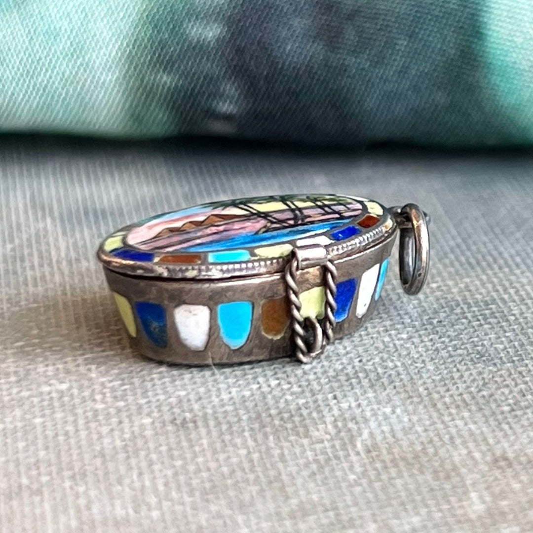 Side view antique silver enamel locket pendant