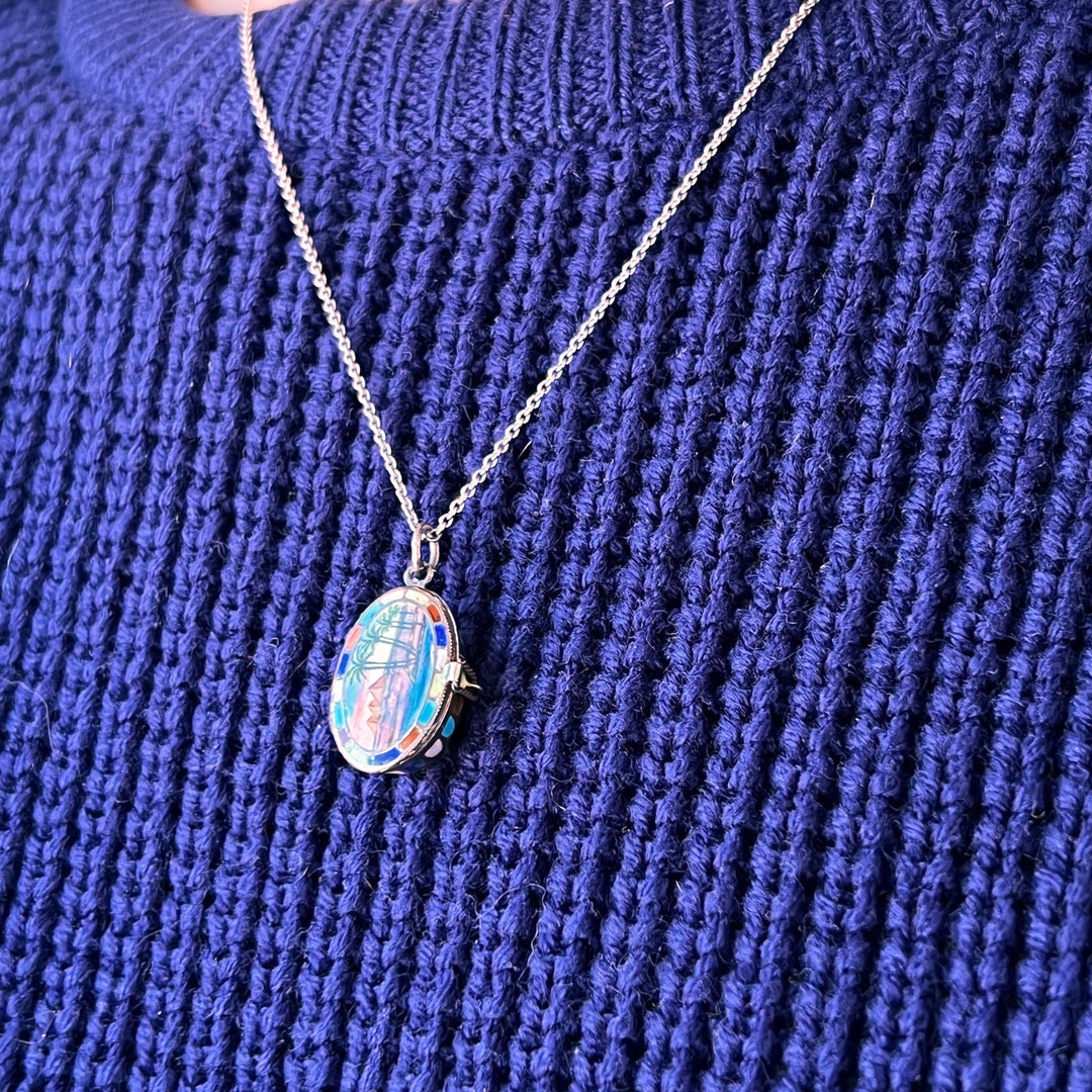 Antique Silver Egyptian Revival Enamel Locket Charm with Tiny Baby Figure c. 1900