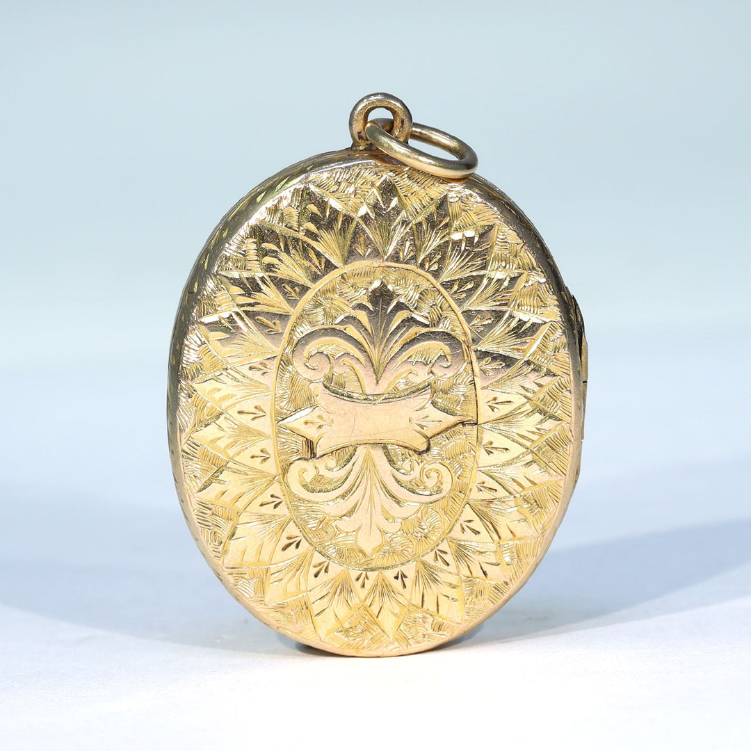 Victorian floral jewelry with detailed gold engraving