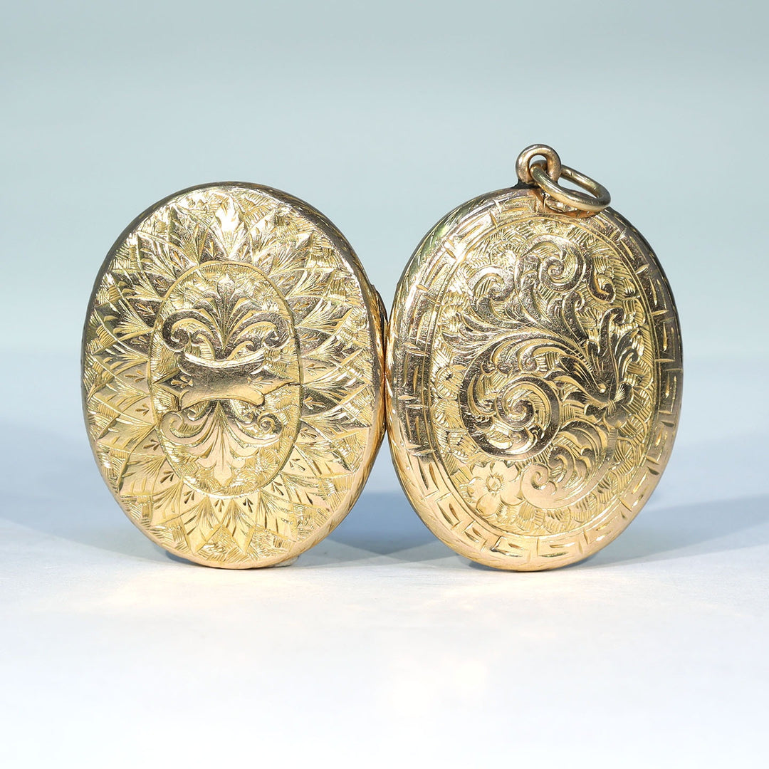 Victorian gold photo locket with elaborate floral engraving