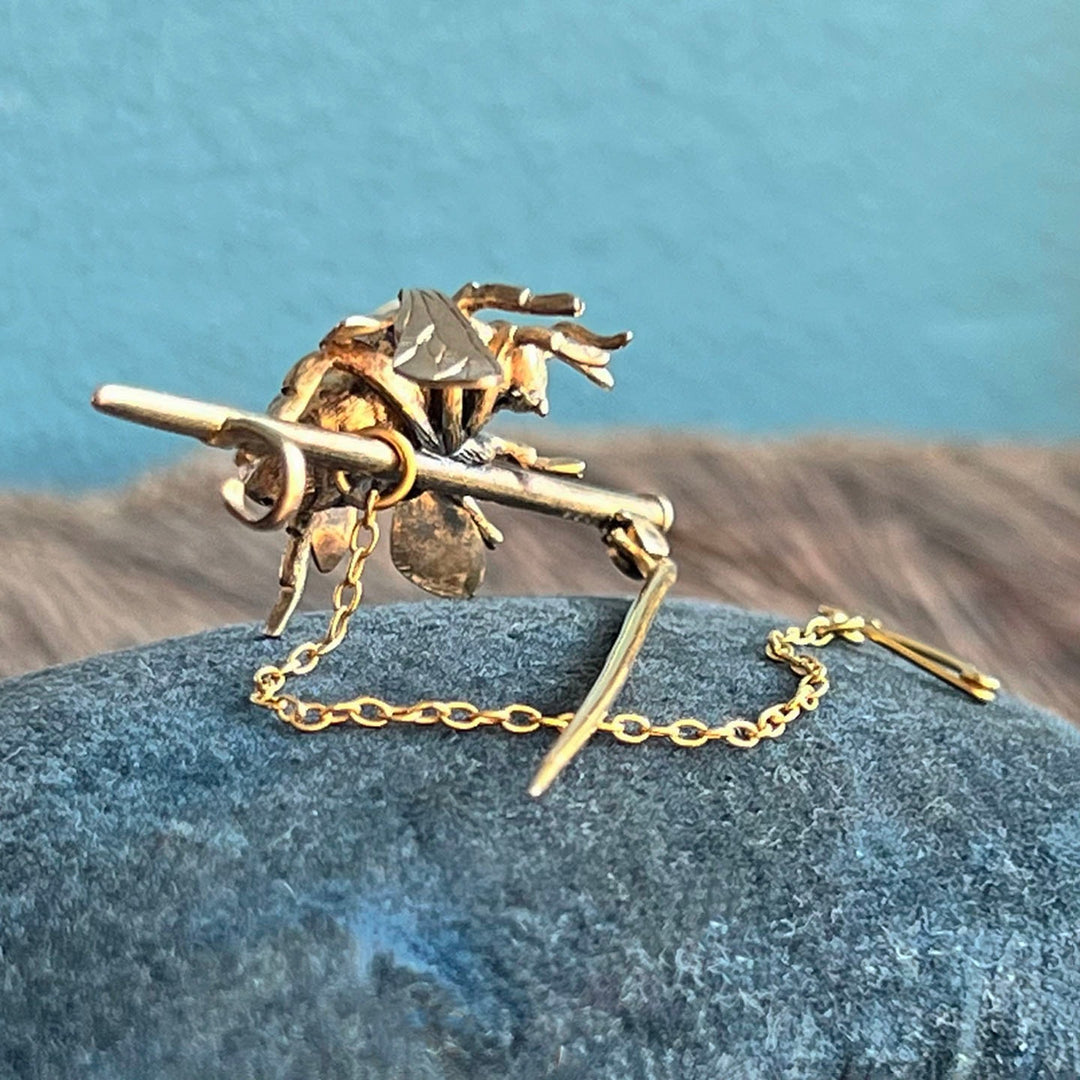 Victorian gold brooch with pearl accents