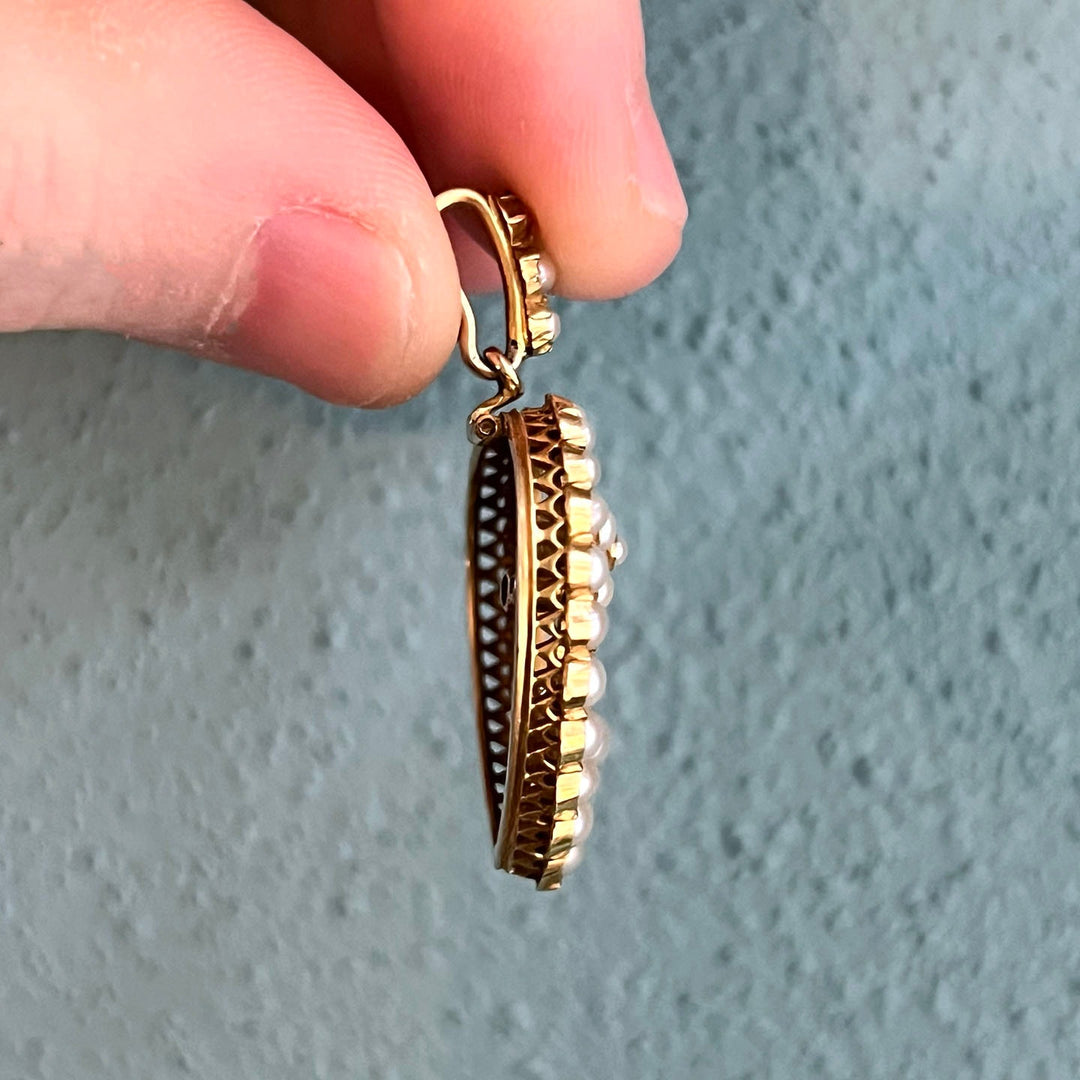 Side profile of Victorian gold pendant