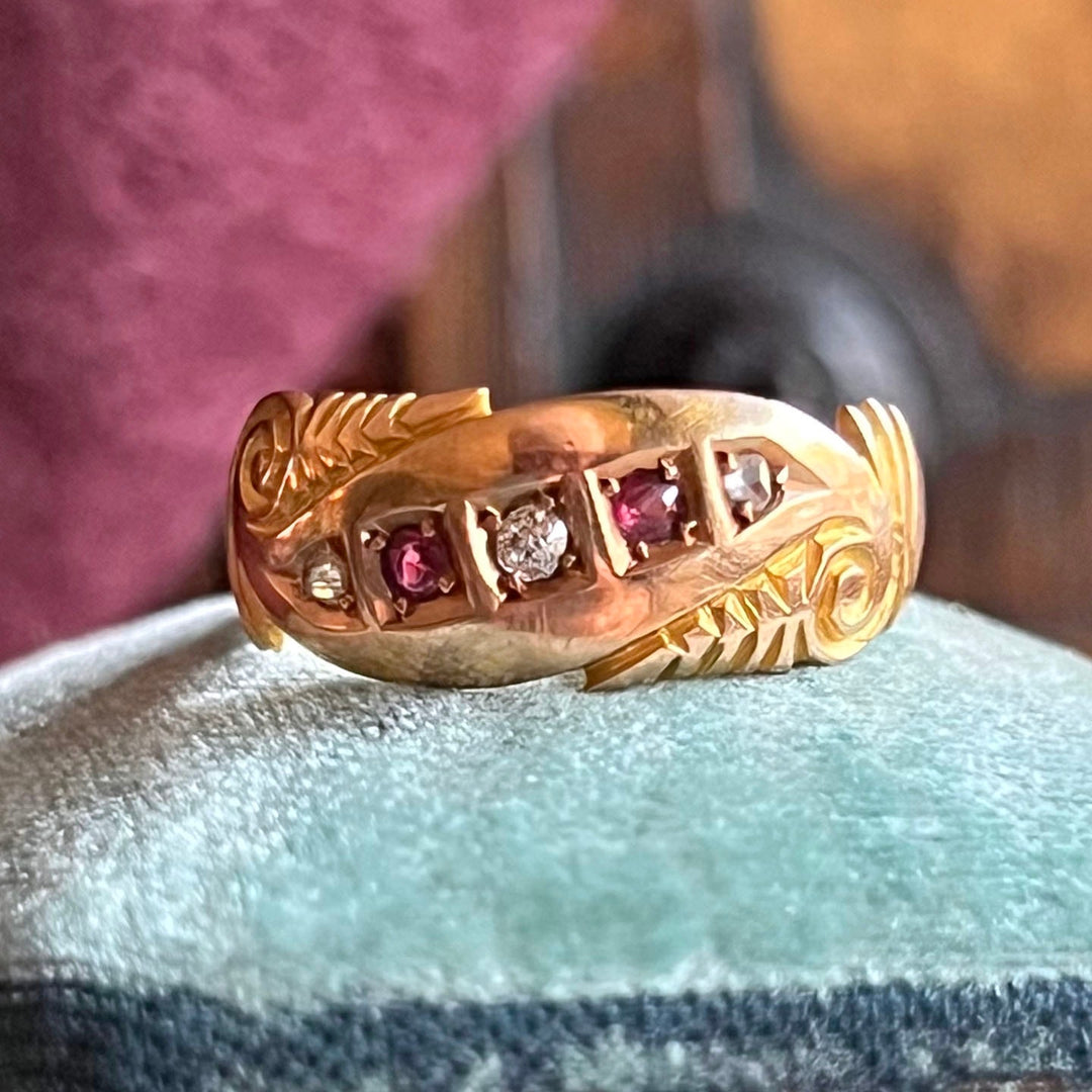 Antique Victorian ruby and diamond five stone ring in 15k gold Birmingham 1897 with three red rubies and two old cut diamonds