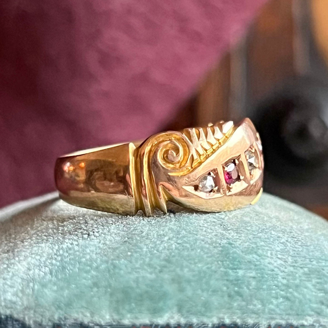 Antique Victorian ruby and diamond five stone ring in 15k gold Birmingham 1897 with three red rubies and two old cut diamonds
