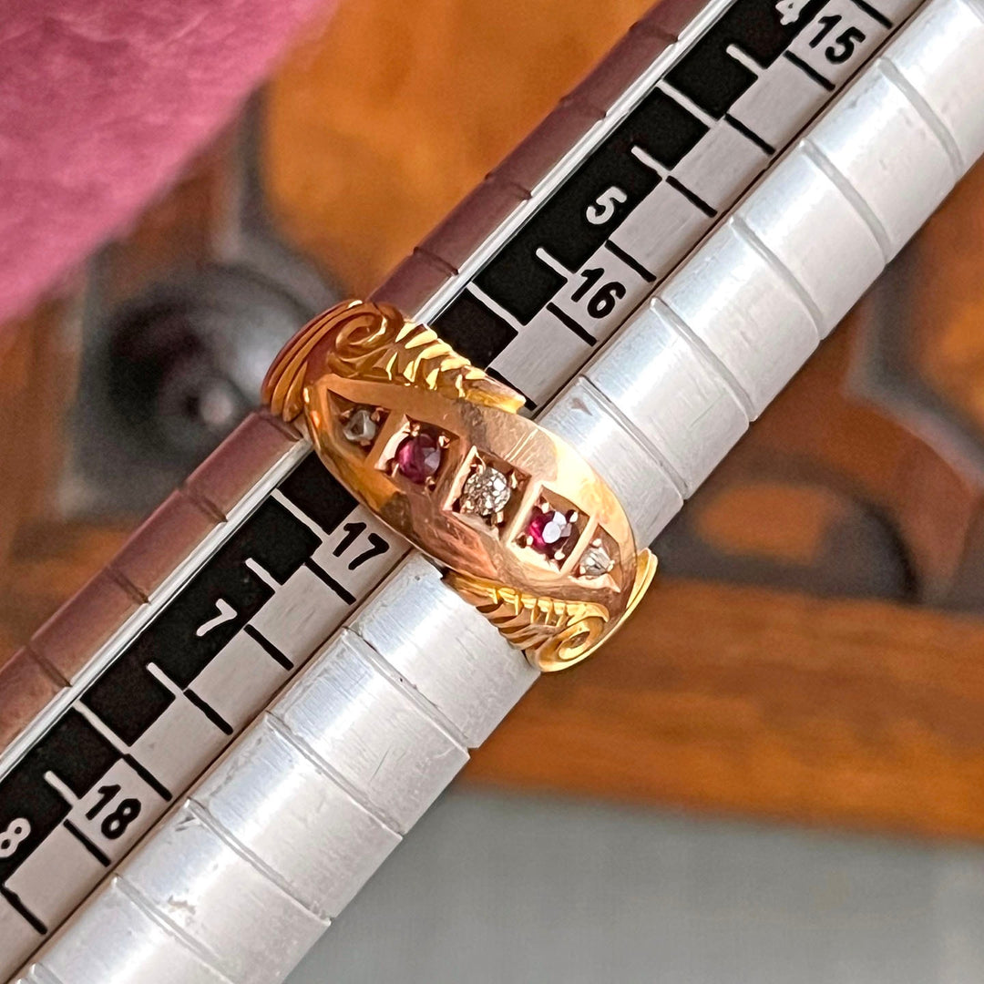 Antique Victorian ruby and diamond five stone ring in 15k gold Birmingham 1897 with three red rubies and two old cut diamonds