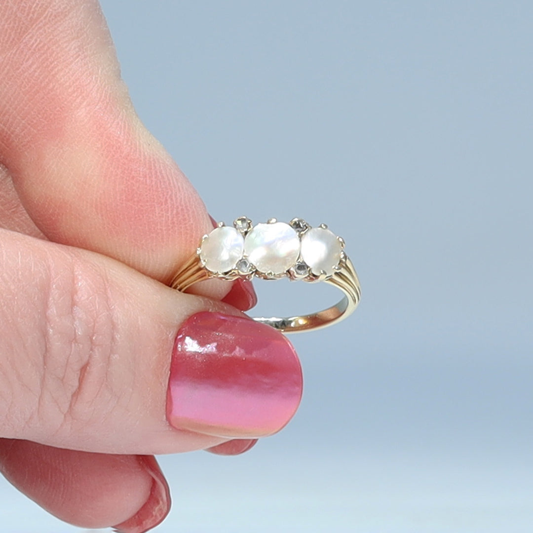 Victorian seven stone ring with luminous mother of pearl