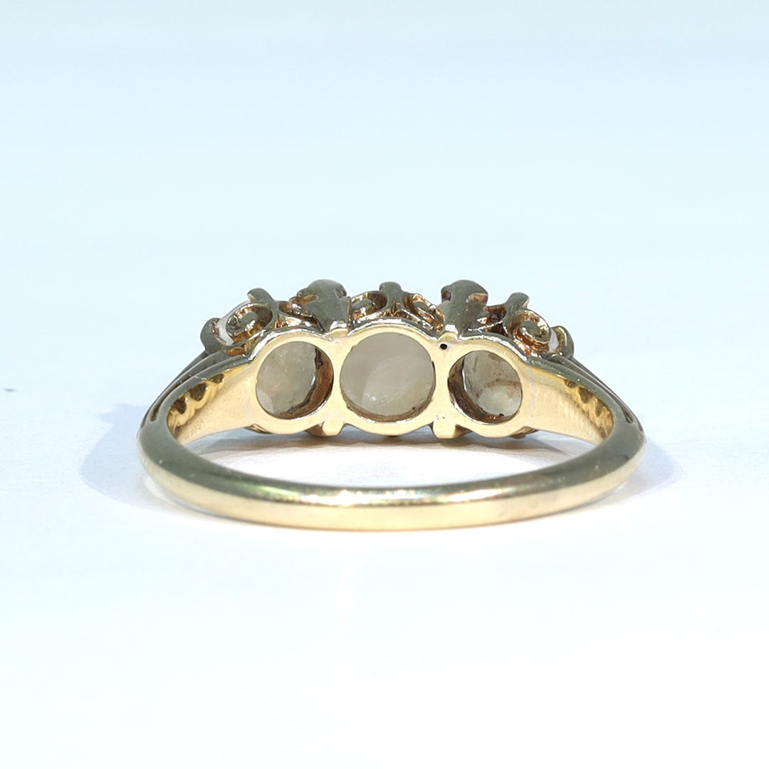 Victorian seven stone gold ring with diamond accents