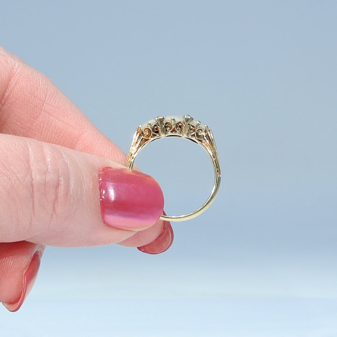 Victorian mother of pearl ring accented with rose cut diamonds