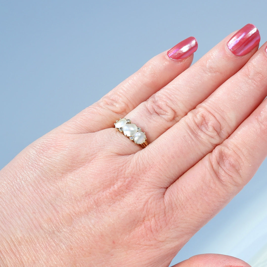 Victorian seven stone gold ring with diamond accents