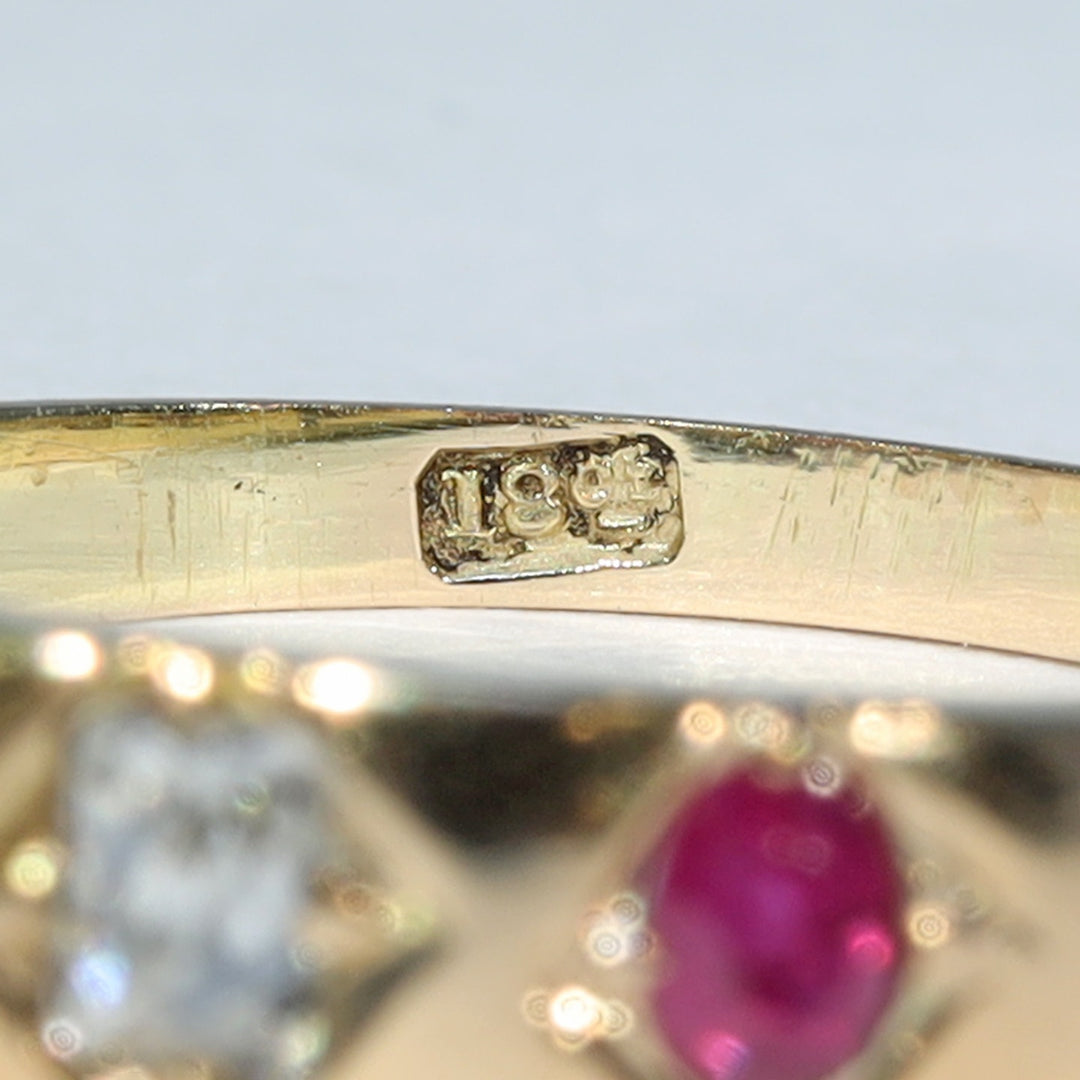 Ruby and diamond antique ring with 18 CT hallmark
