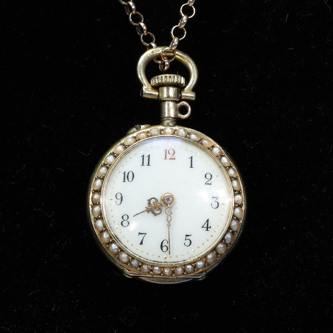 Antique jeweled watch with 44 rubies and 109 pearls
