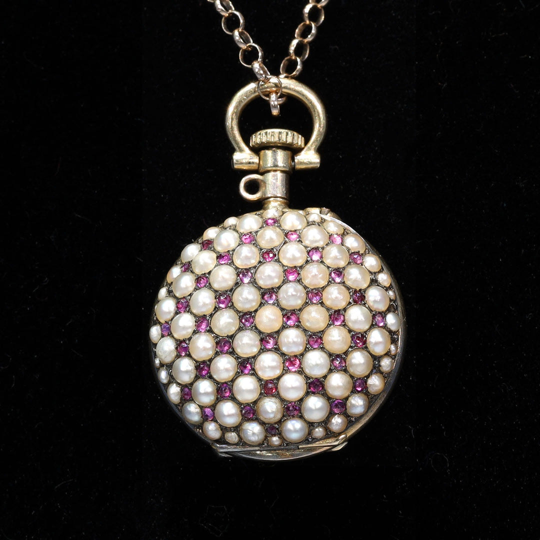Victorian gold watch pendant set with rubies and pearls