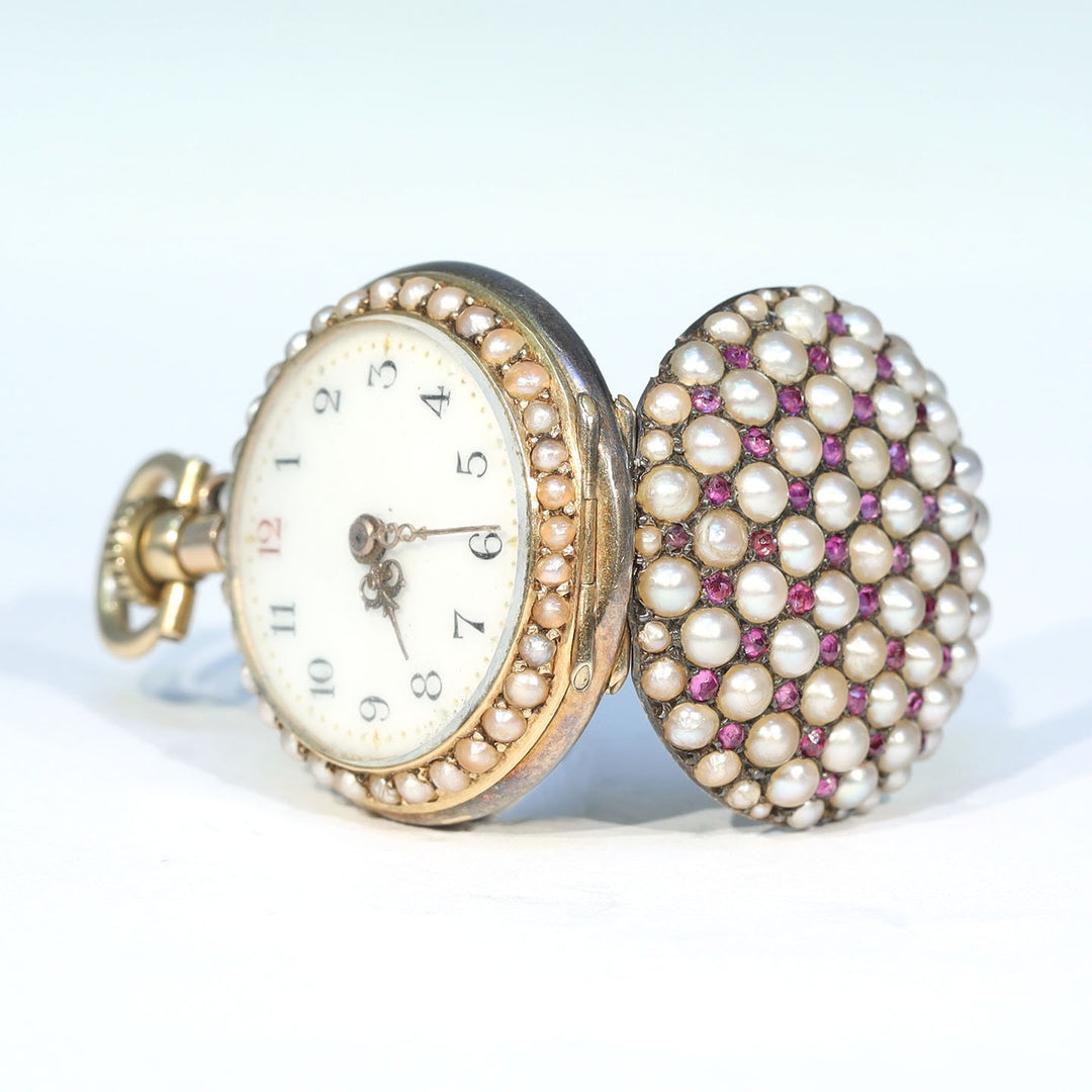 Collectible Victorian pendant watch in 18 karat gold