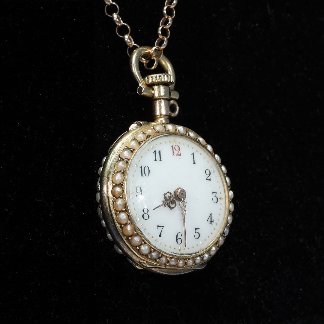 Antique jeweled watch with 44 rubies and 109 pearls
