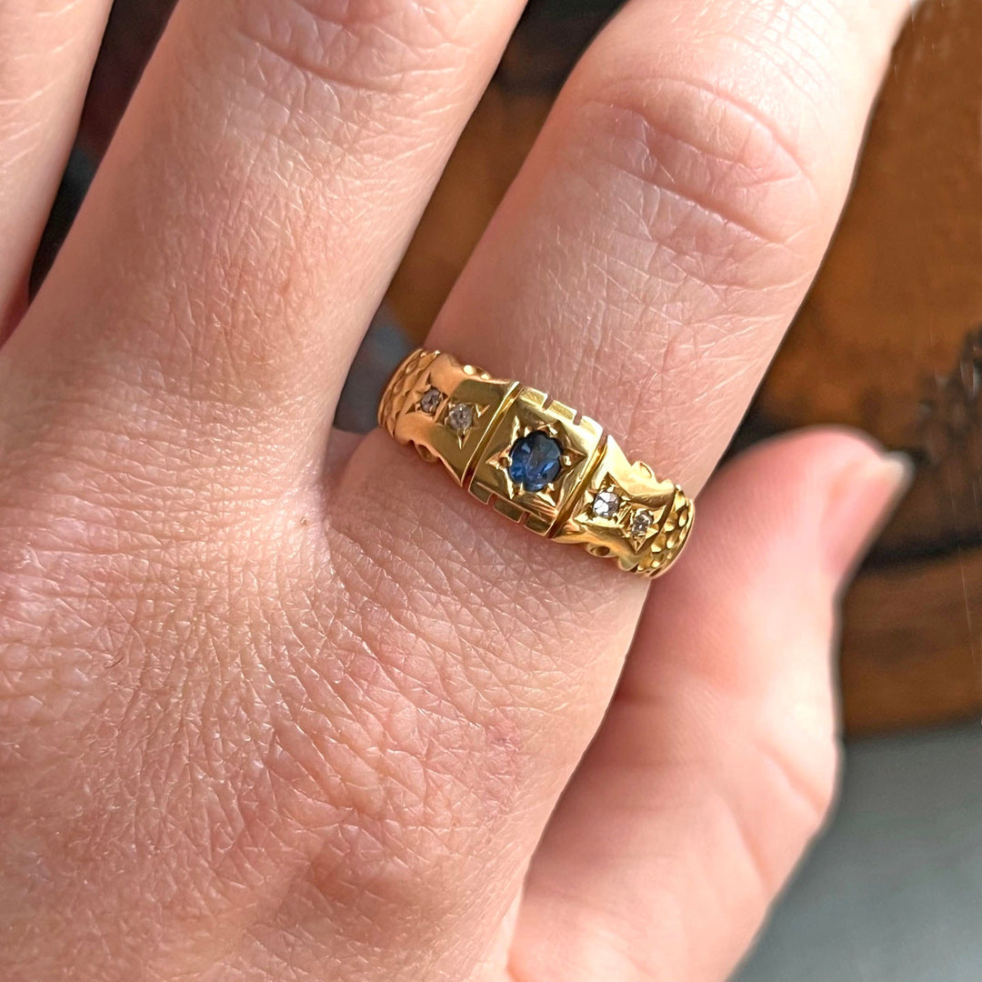 Victorian sapphire ring worn on hand antique style