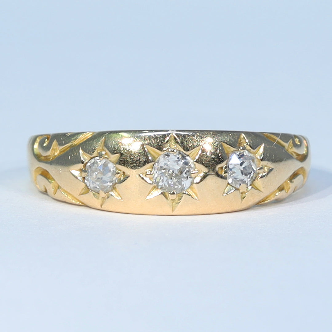 Victorian diamond engagement ring with classic trilogy setting