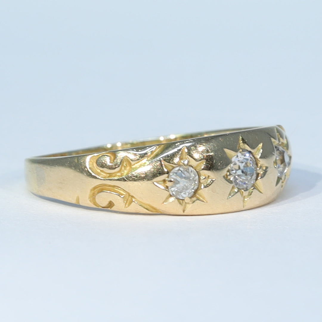 Victorian diamond engagement ring with classic trilogy setting
