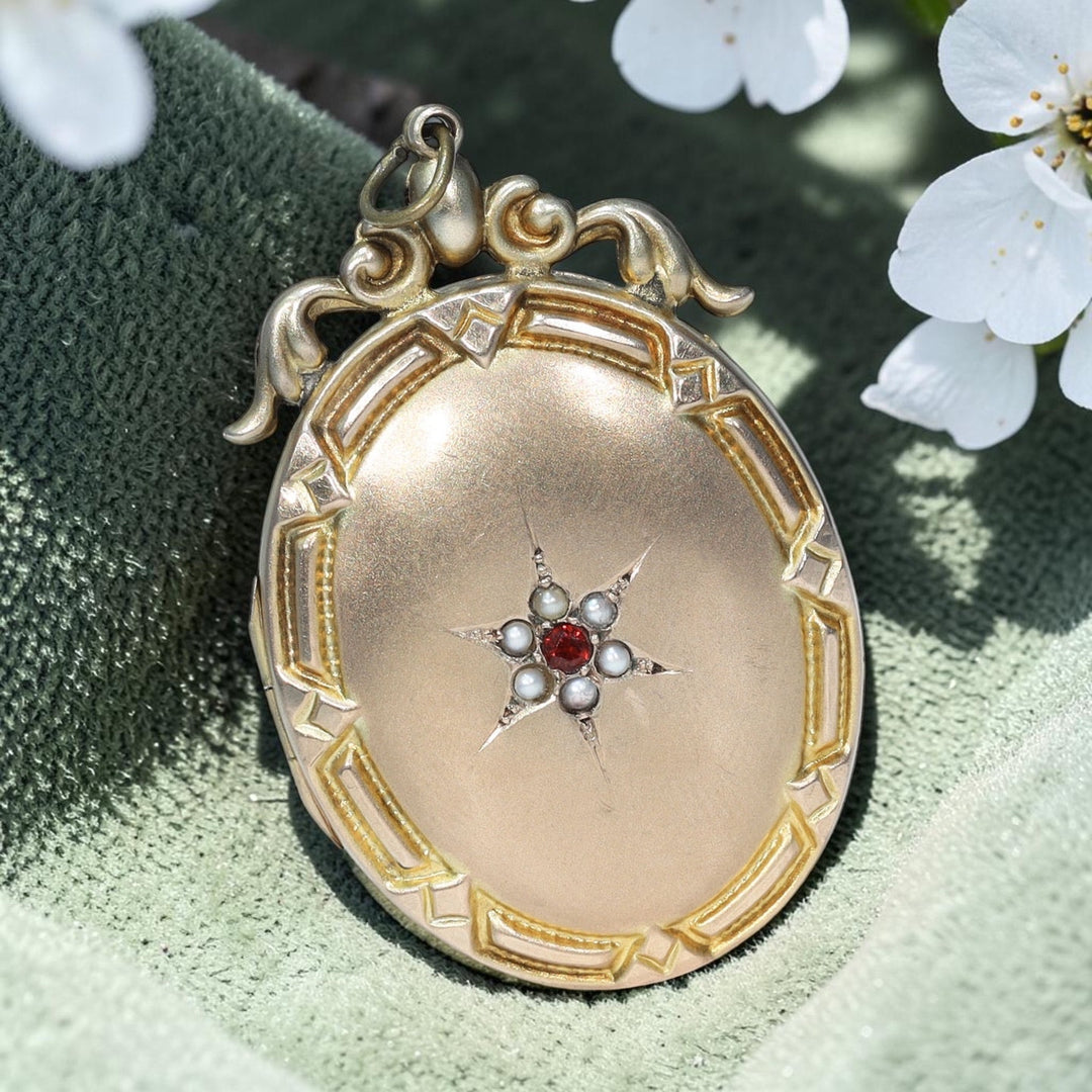 Antique Victorian 9 karat gold garnet pearl locket