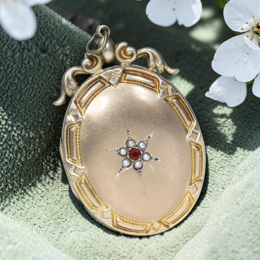 Antique Victorian 9 karat gold garnet pearl locket