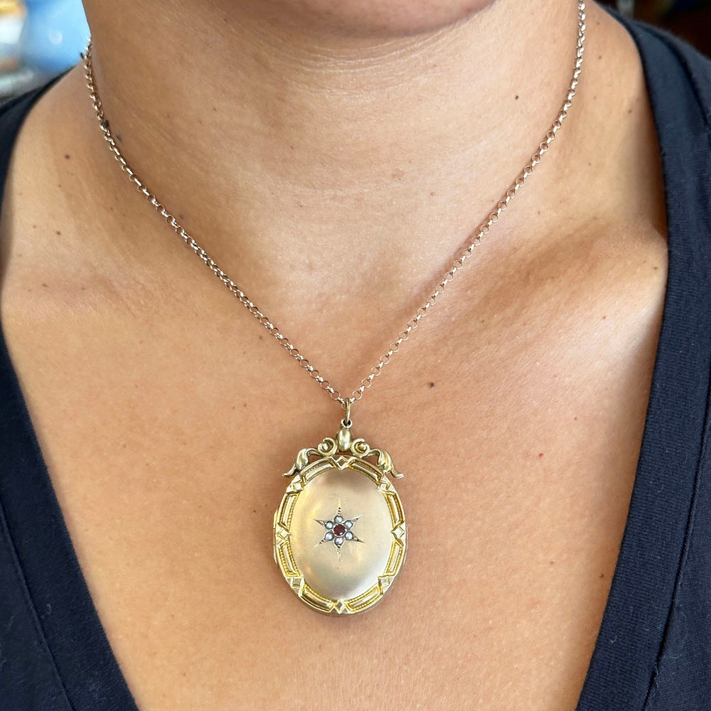 Victorian gold locket with red garnets and pearls