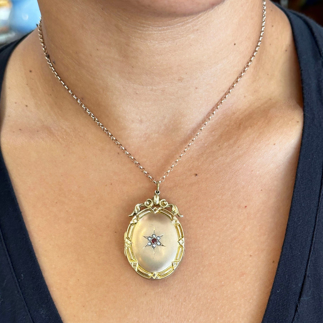 Victorian gold locket with red garnets and pearls