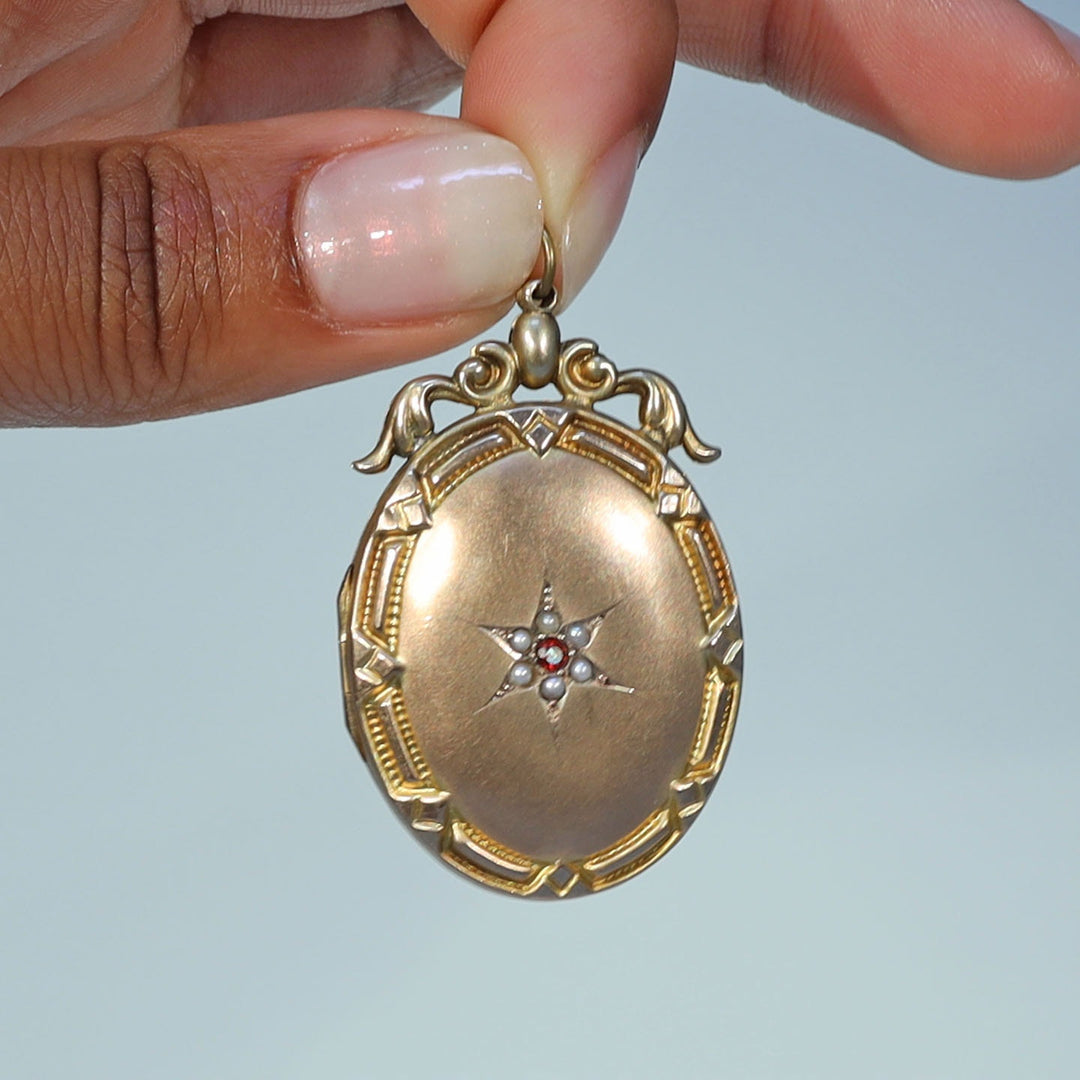 Antique garnet and pearl keepsake pendant circa 1890