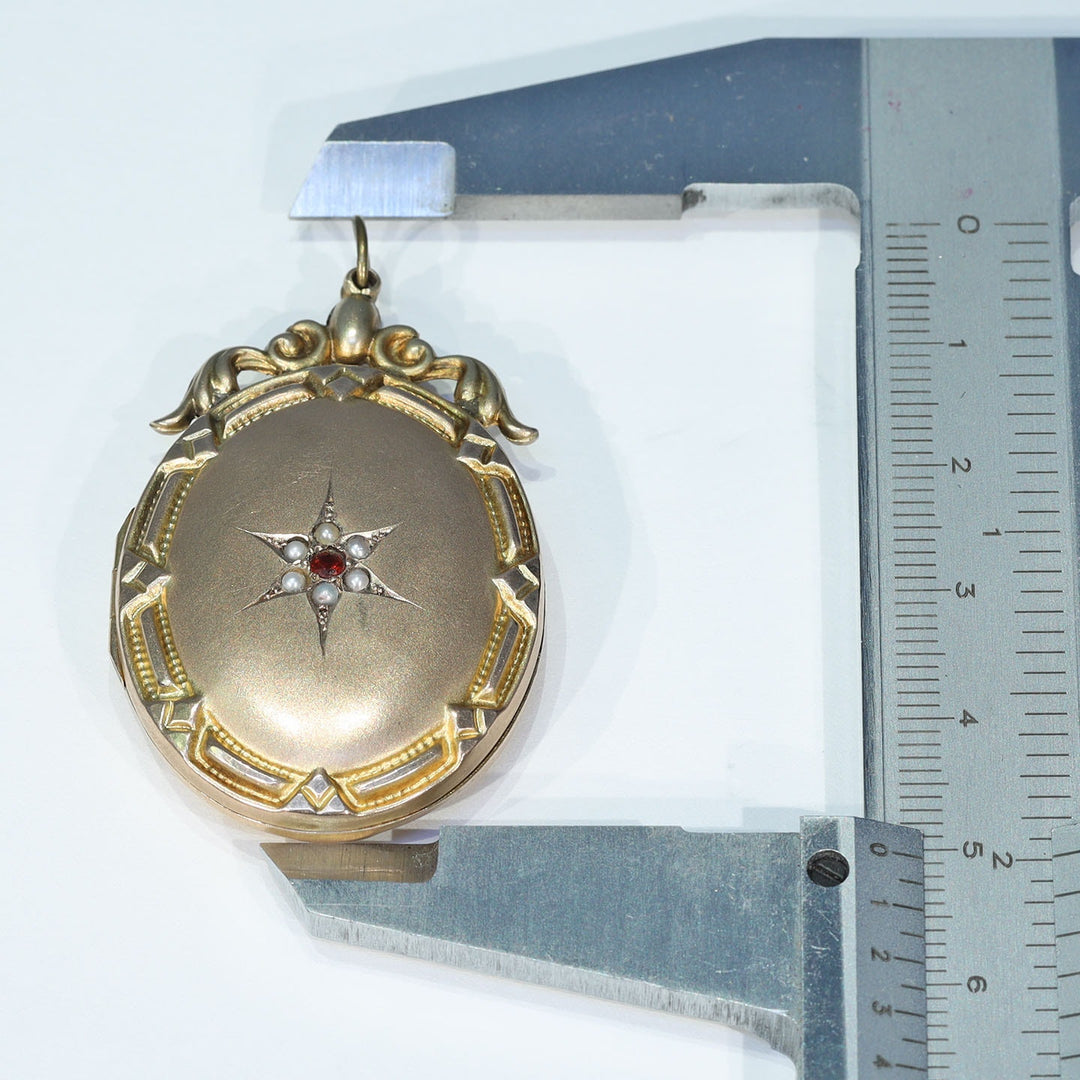 Collectible antique gold locket with romantic gemstone design