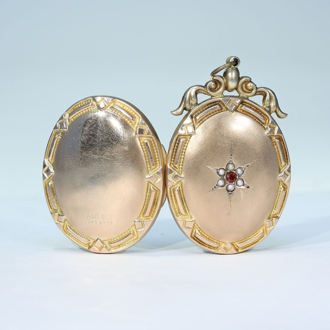Antique Victorian 9 karat gold garnet pearl locket