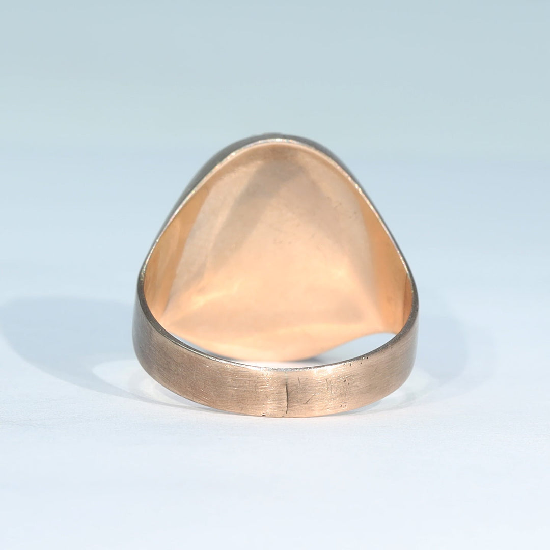 Antique 9 karat gold cameo ring with closed back setting