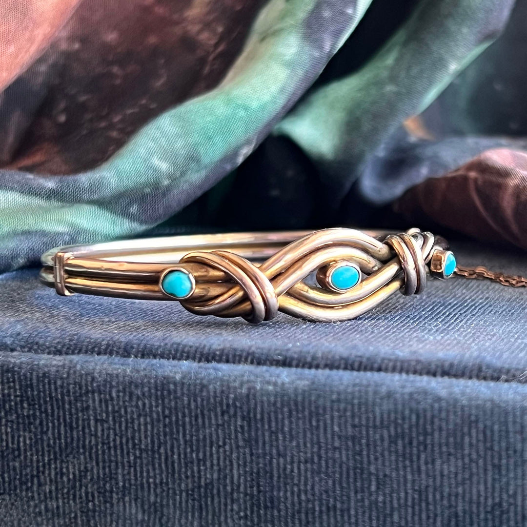 Side view gold love knot bangle turquoise accents