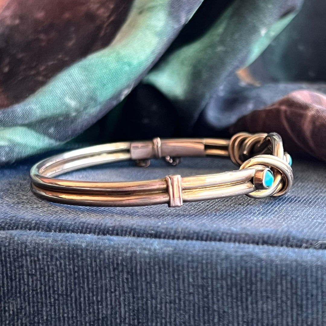 Side view gold love knot bangle turquoise accents