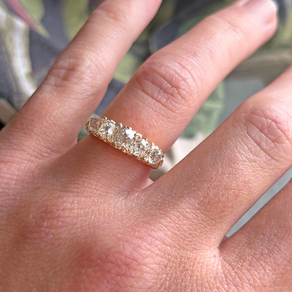 Victorian diamond boat ring worn on hand antique design