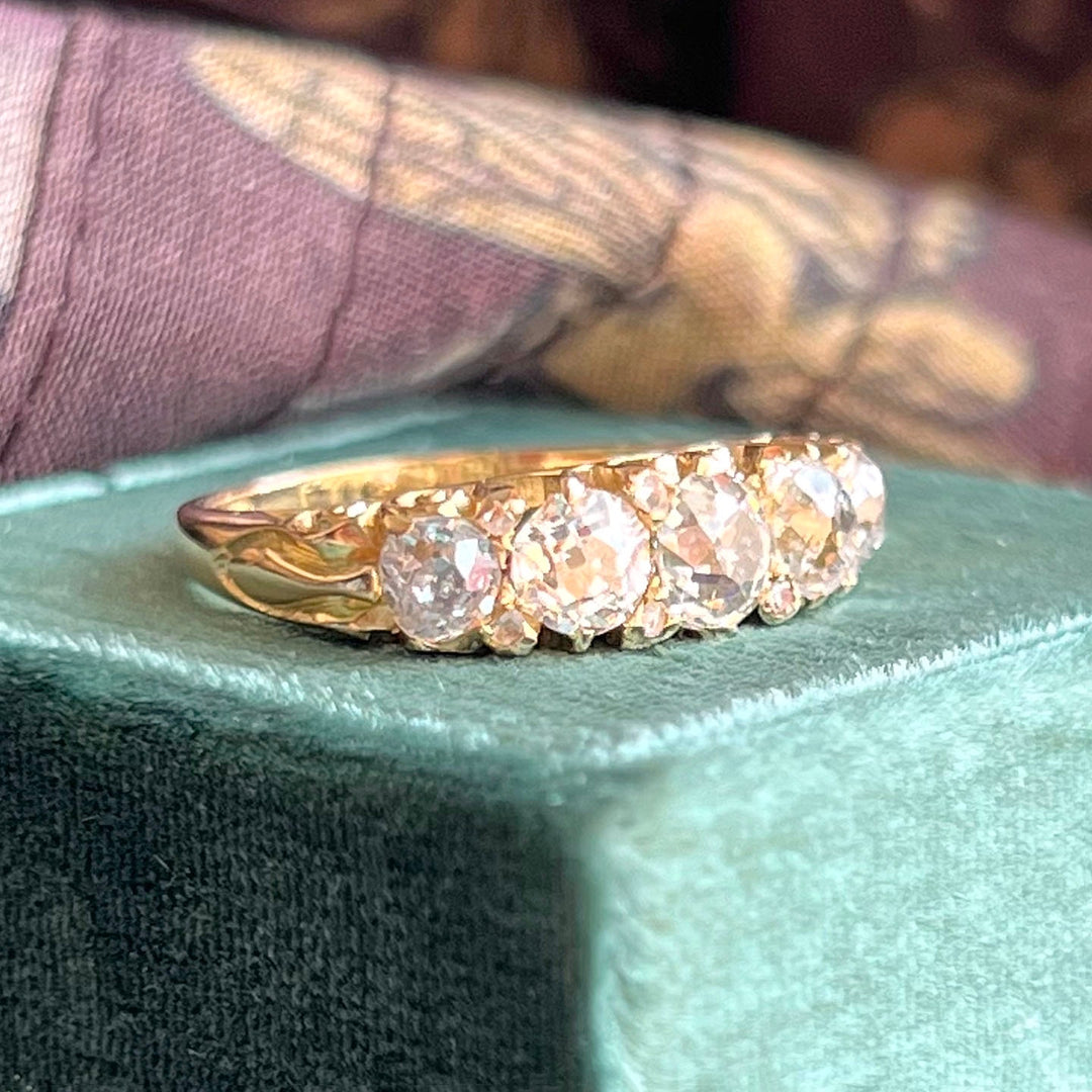 Victorian diamond navette ring angled view old cut diamonds