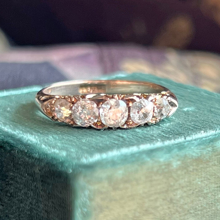 Antique Victorian five stone diamond ring in 18k gold circa 1900 with graduated old cut diamonds in classic English setting