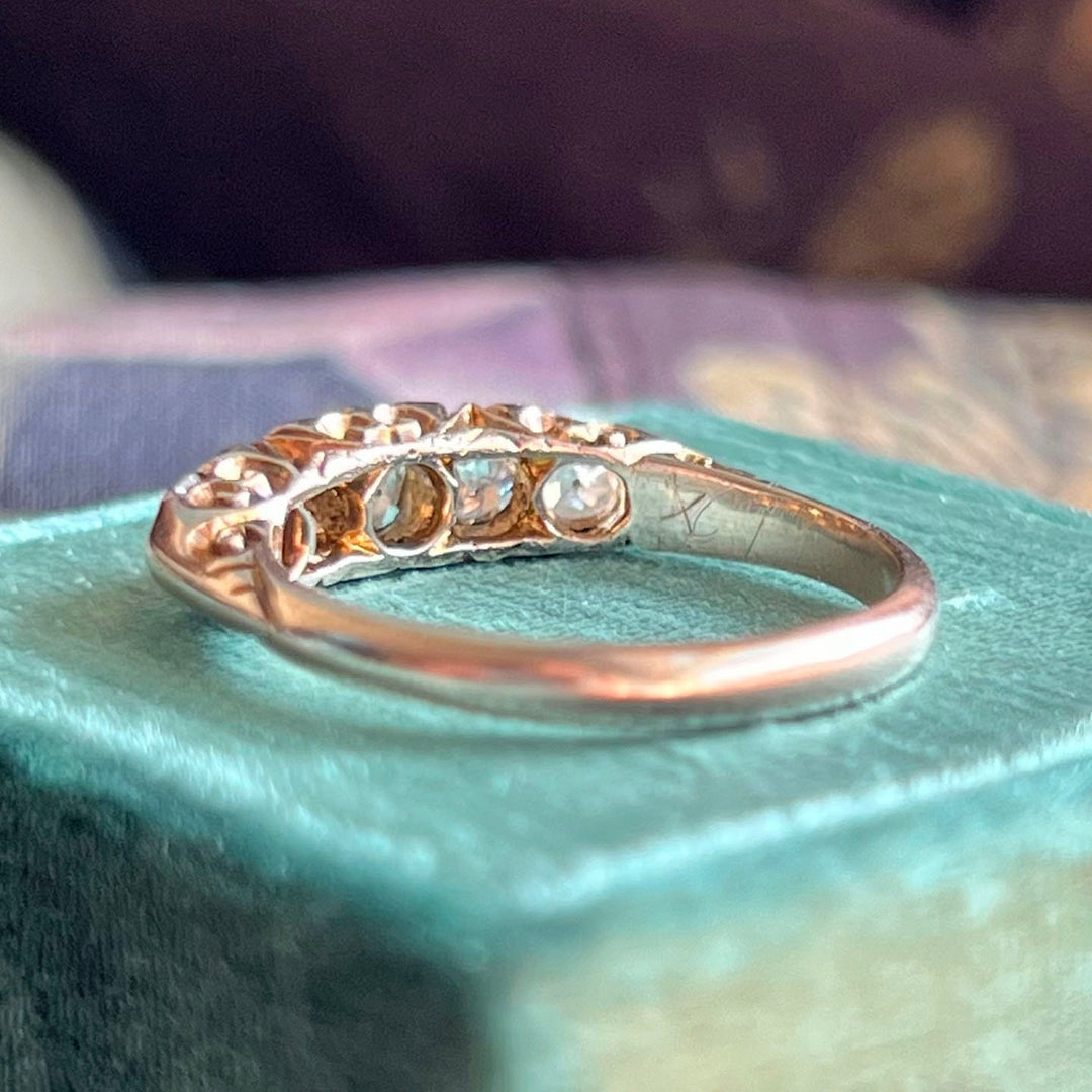 Antique Victorian five stone diamond ring in 18k gold circa 1900 with graduated old cut diamonds in classic English setting