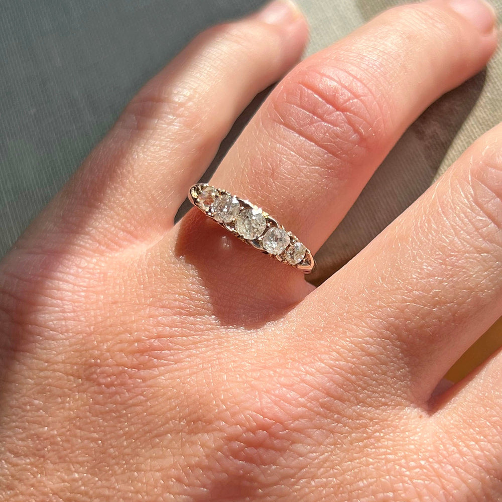 Antique Victorian five stone diamond ring in 18k gold circa 1900 with graduated old cut diamonds in classic English setting