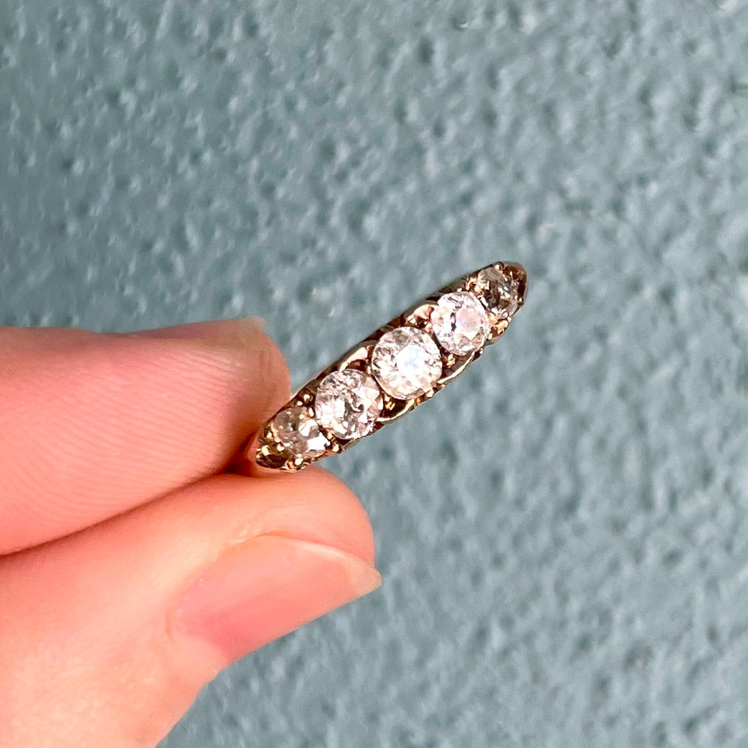 Antique Victorian five stone diamond ring in 18k gold circa 1900 with graduated old cut diamonds in classic English setting