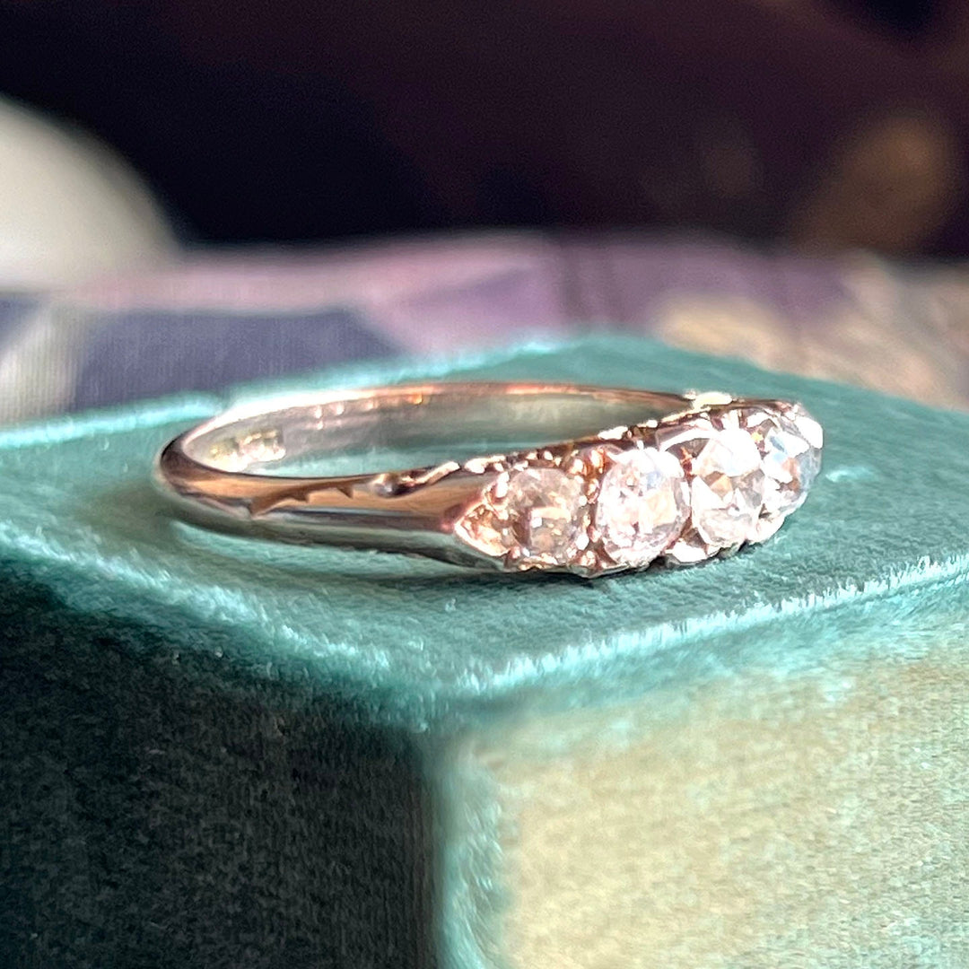 Antique Victorian five stone diamond ring in 18k gold circa 1900 with graduated old cut diamonds in classic English setting