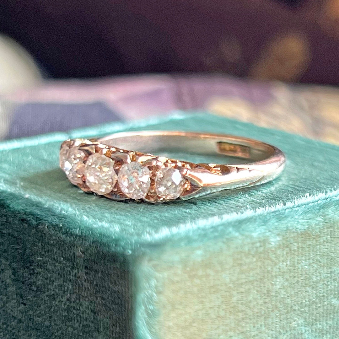 Antique Victorian five stone diamond ring in 18k gold circa 1900 with graduated old cut diamonds in classic English setting