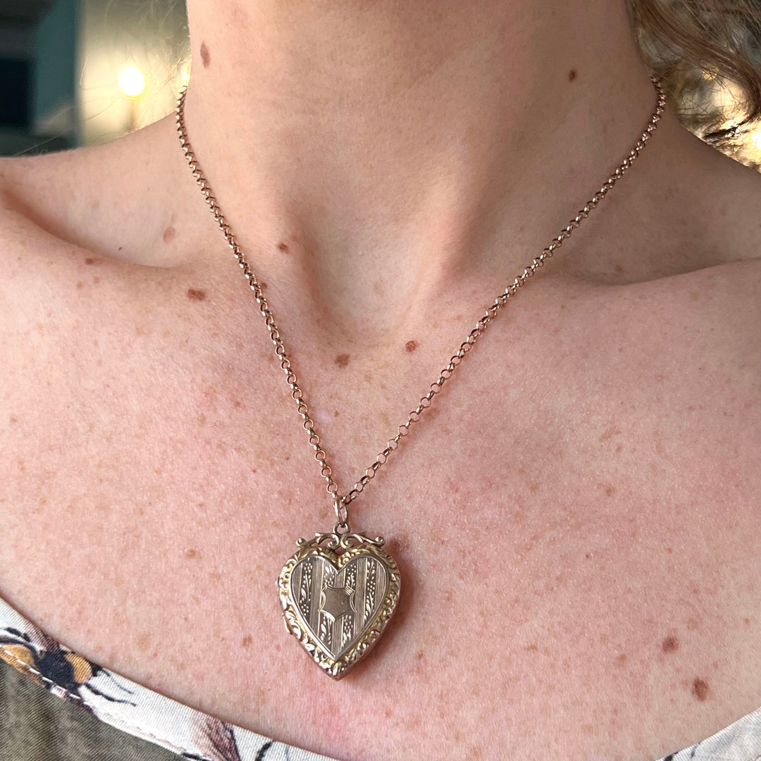 Heart shaped antique locket in gold