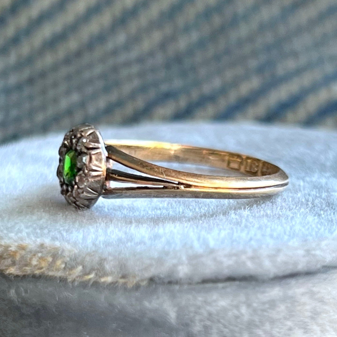 Detail of green garnet and diamond setting antique ring