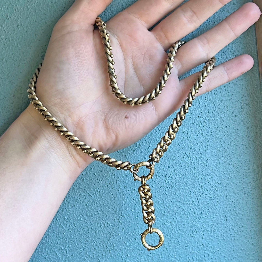 Detail of antique gold articulated link necklace