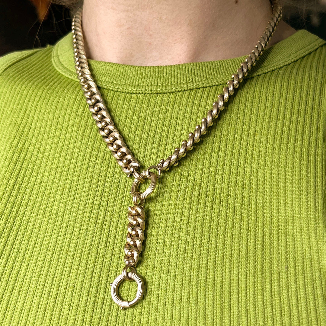 Victorian gold collar necklace worn on neck statement style