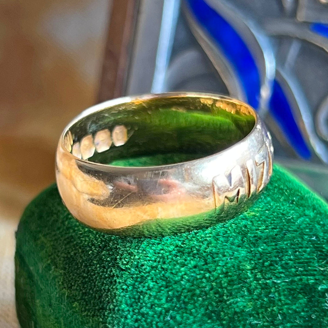 Close up antique MIZPAH ring engraved lettering