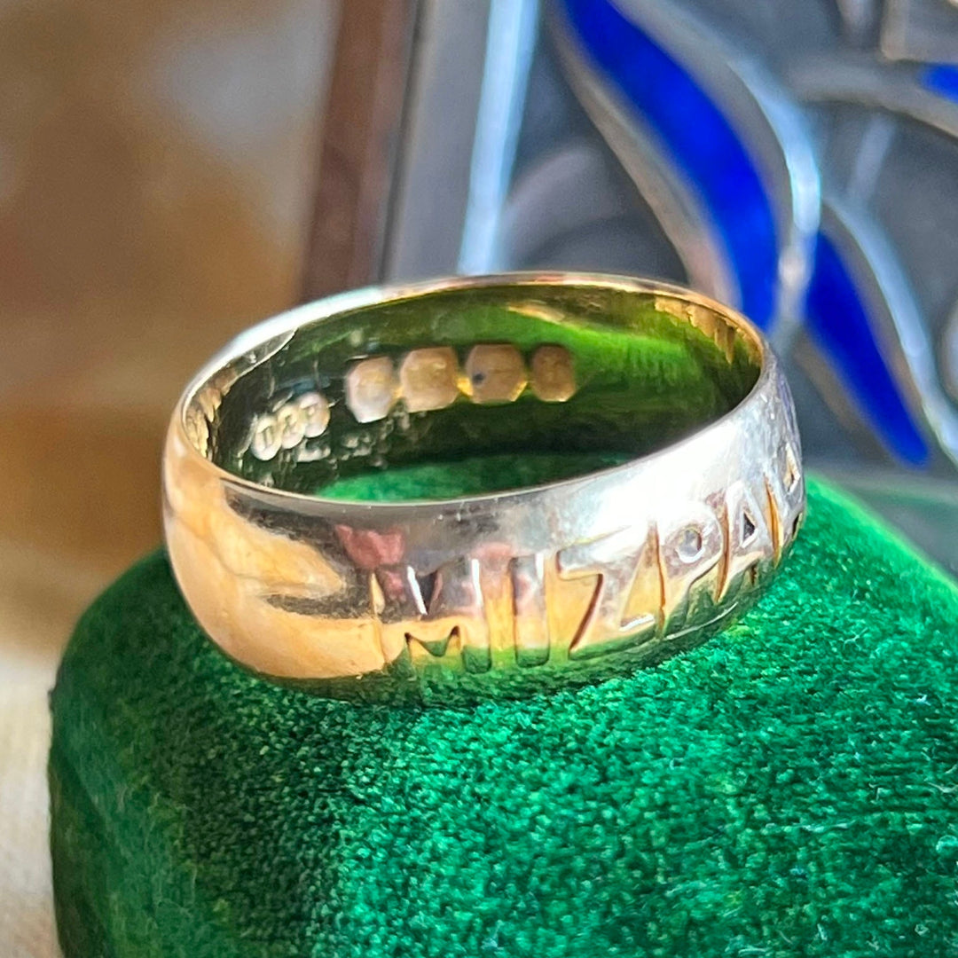 Close up antique MIZPAH ring engraved lettering