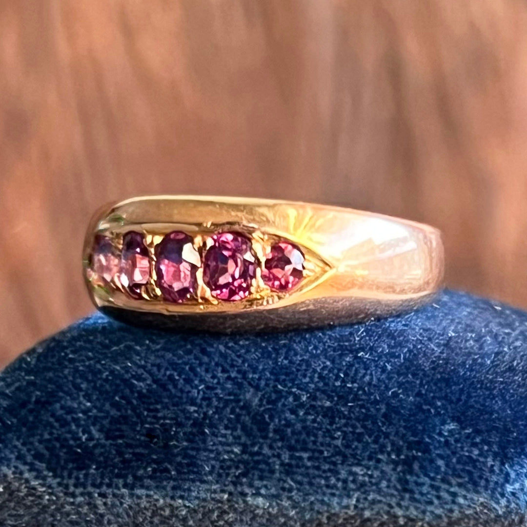 Close view of vivid ruby half hoop ring