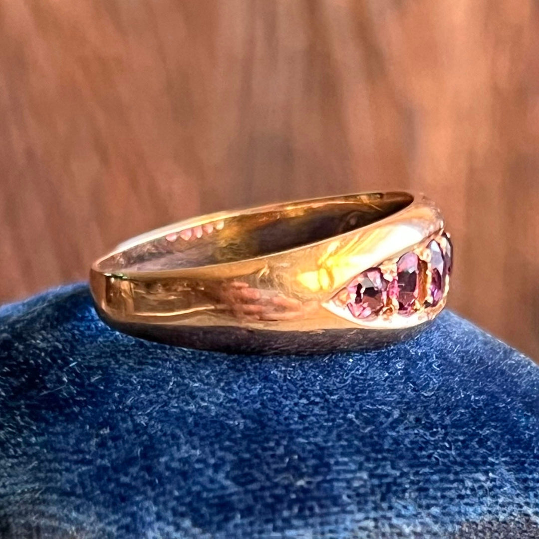 Side profile of five stone ruby ring